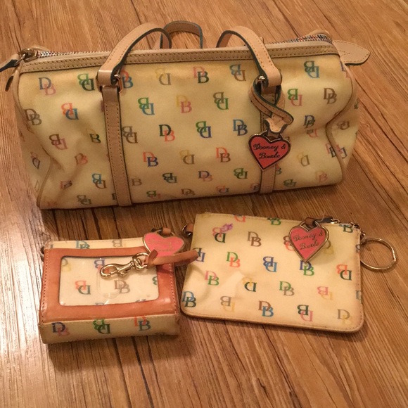 Dooney & Bourke Handbags - Authentic Dooney & Bourke cream w/pastel monogram